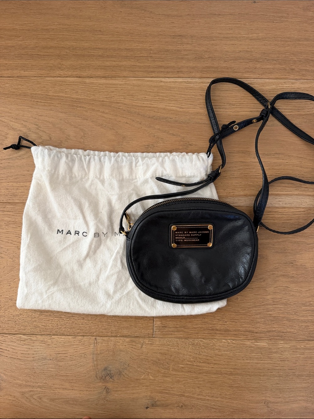 Marc by Marc Jacobs Black Leather Oval Crossbody with Gold Plate